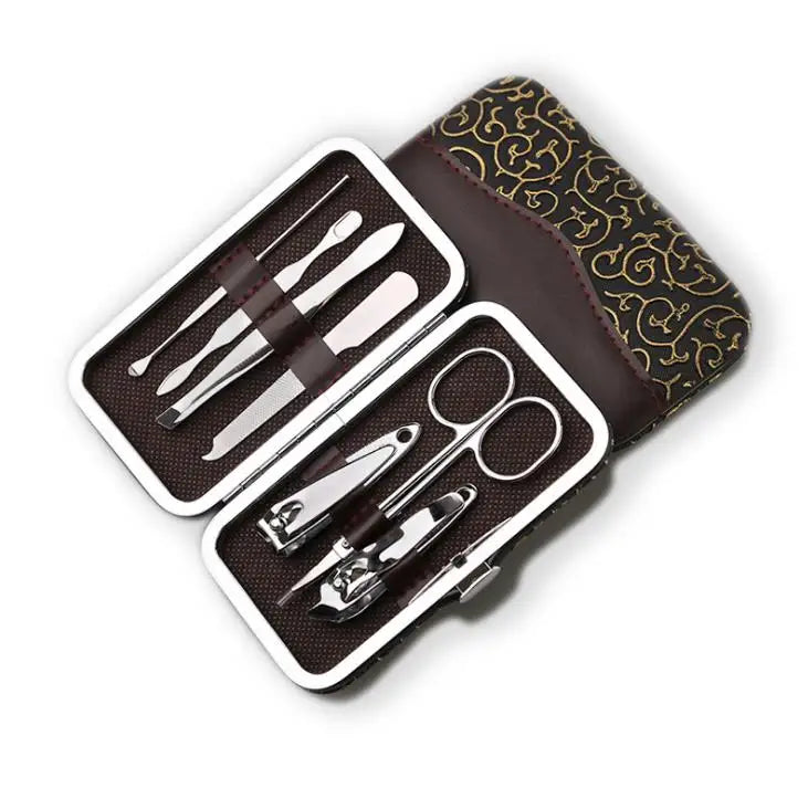 100pcs/lot 7 in 1 Nail Tools Manicure Set Feet Care Clipper Kit Pedicure Tweezer Knife Ear Pick Utility Nail Cutter Gifts SN553